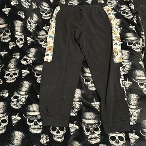 Black with micky mouse cartoon characters